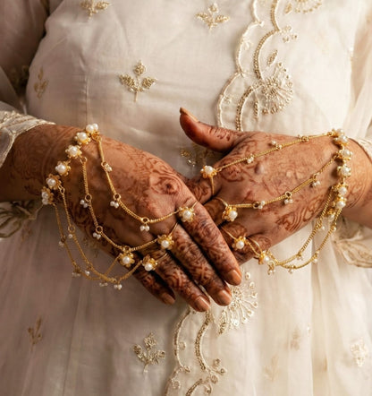 Gold-Plated Pearl Haathphool – Bridal Hand Chain Jewelry with Finger Rings